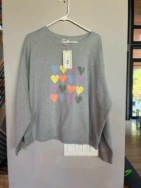NWT Pact sweatshirt with heart motif
